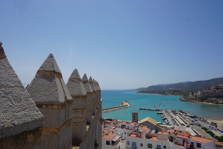 Peñíscola castle battlements overlooking Mediterranean harbour, Spain